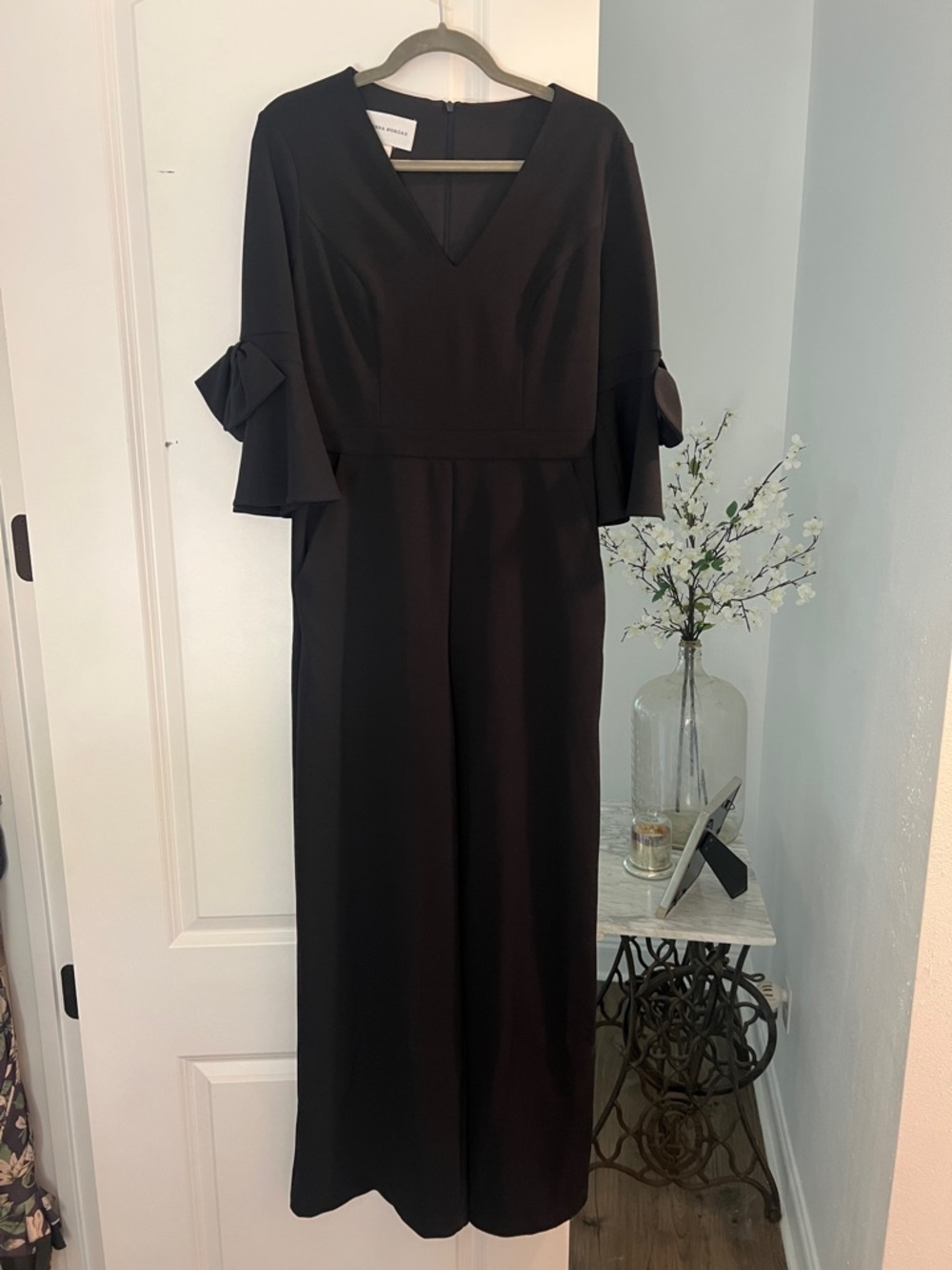 Navy V-Neck Wide-Leg Jumpsuit with bow and Ruffle Sleeve Detail